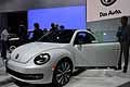 Volkswagen Beetle bianca con tettuccio panoramico